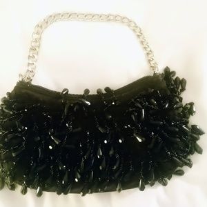 Small beaded handbag with silver chain